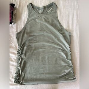 Lululemon swiftly speed cinch tank.  Size 10.  Ice blue/grey color.